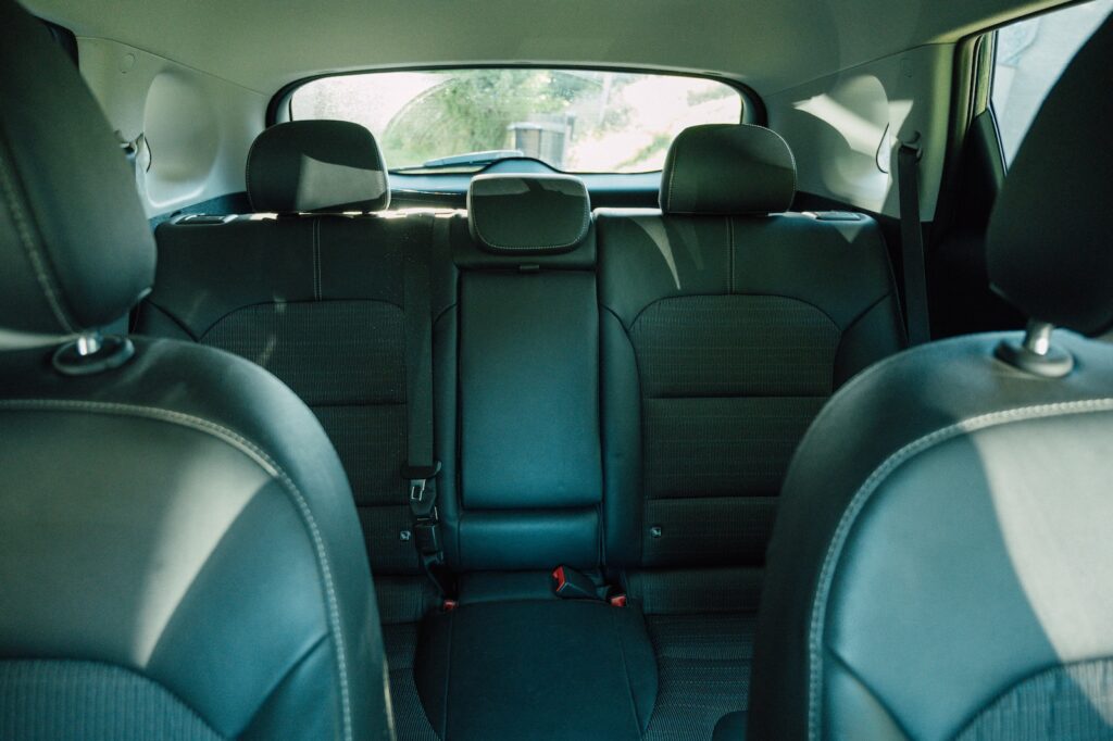black leather car seat during daytime